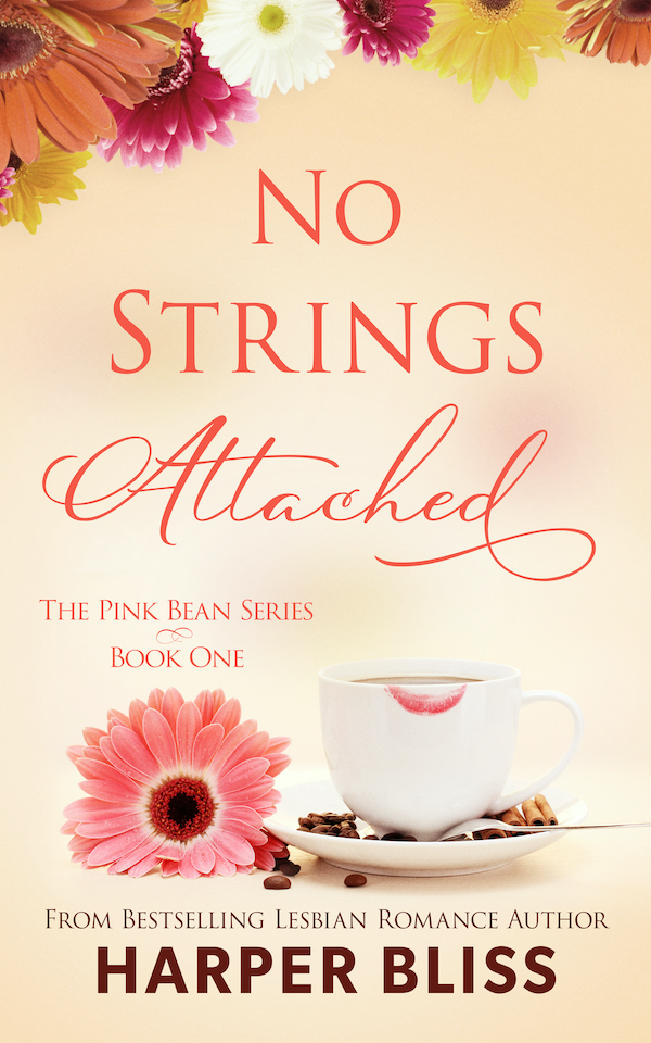 Book cover of No Strings Attached by Harper Bliss, featuring a coffee cup with a lipstick stain, a pink gerbera daisy, and colorful flowers against a soft beige background. The tagline reads 'The Pink Bean Series, Book One